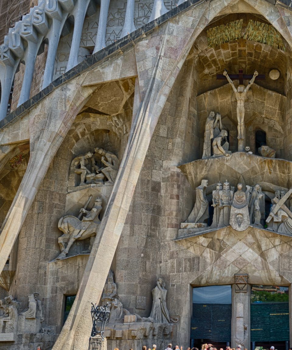 Detailed panoramic view on the bottom part of Sagrada Familia in Barcelona, Spain